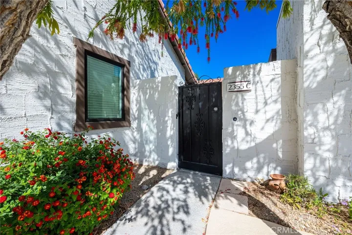 Front gate to unit just steps from the pool.