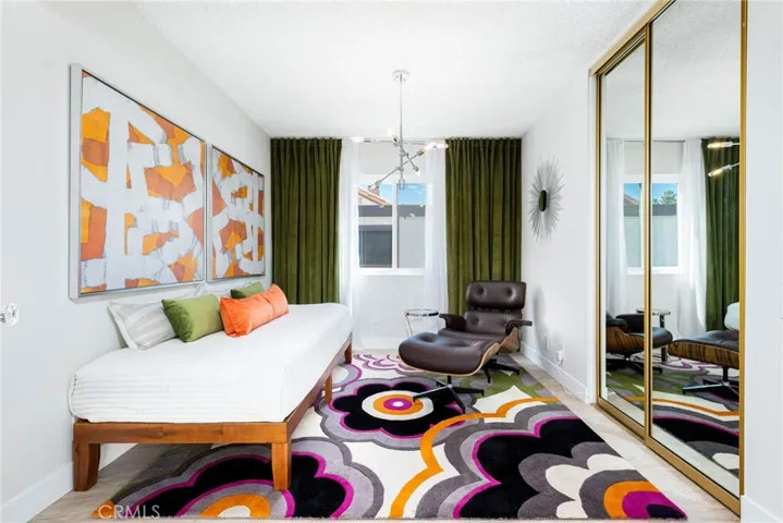 Third bedroom has double doors that open up to the living room and can be used as a den or office.