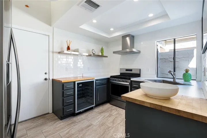 Kitchen door opens to the attached two car garage with laundry.