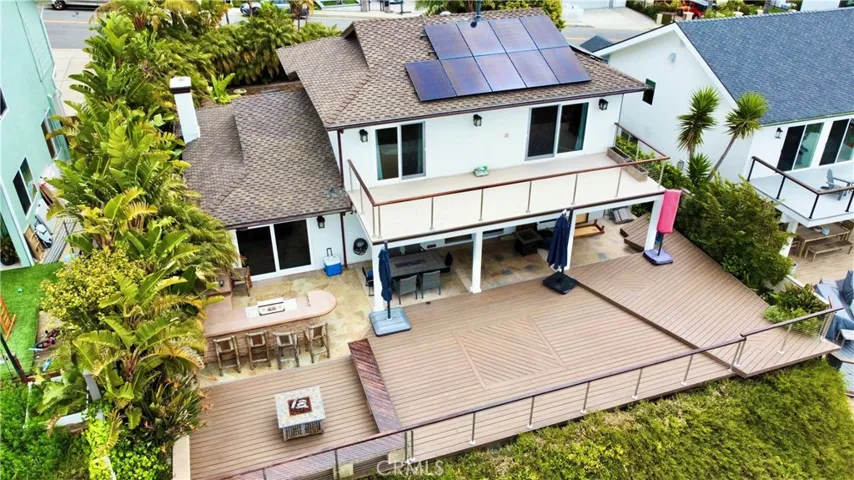 overhead view of the backyard and back of the house