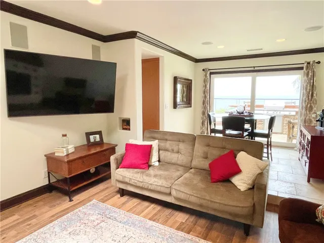 Living Room looking towards formal dining room and rear yard