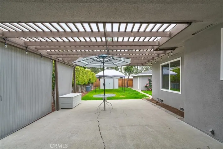 Entry to Backyard w 2 Privacy Shades Down