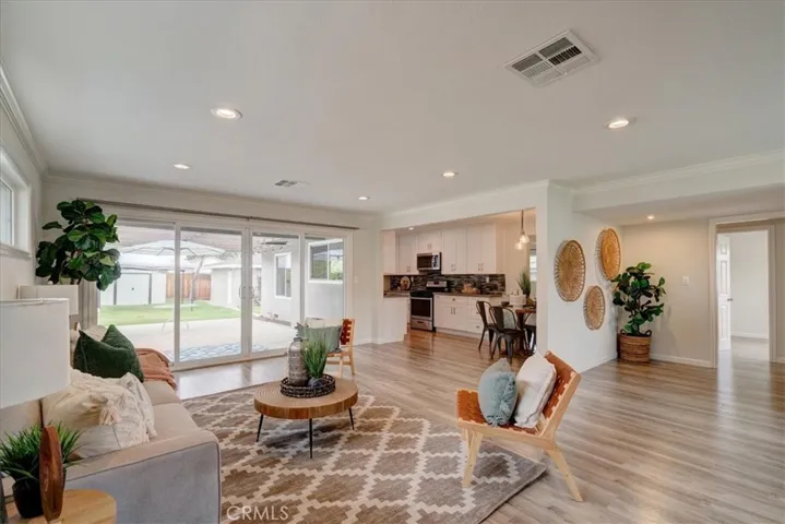 Living Room w View of Dining and Kitchen