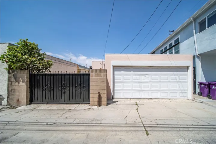 Alley access leads to the 2-car garage.