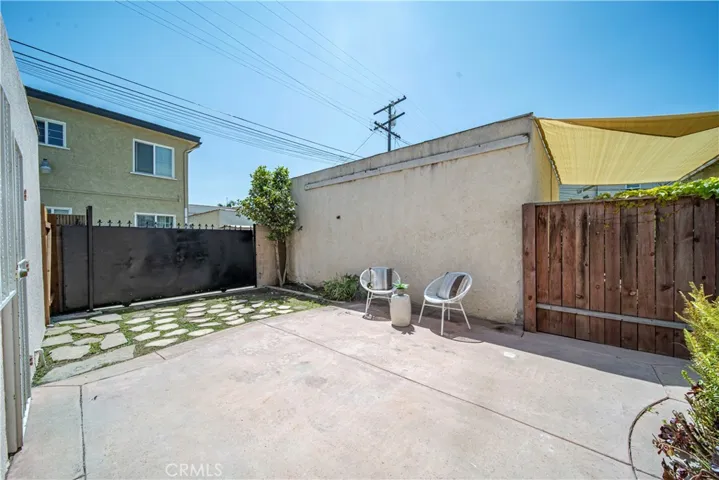 This oversized lot affords the opportunity to have a 2 car-garage and a backyard.