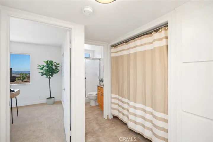 Downstairs hallway with laundry closet