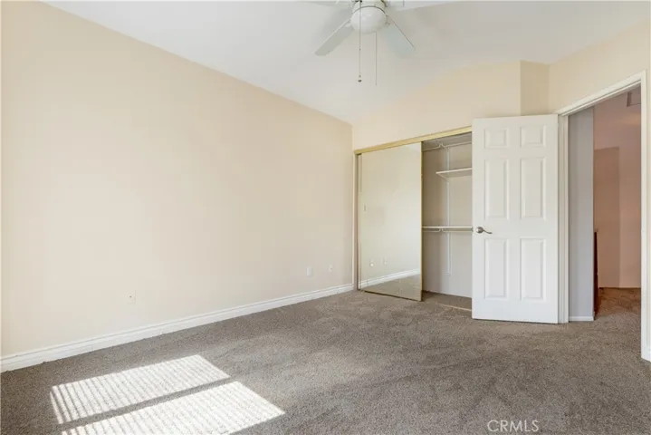 #2 Upstairs Bedroom w/ Mirrored Closet Doors.