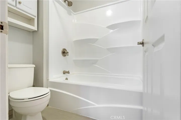 #2 Bathroom - Separate room w/ tub/shower combo & toilet.