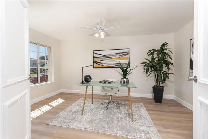 Junior master bedroom with private bath is being used as an office
