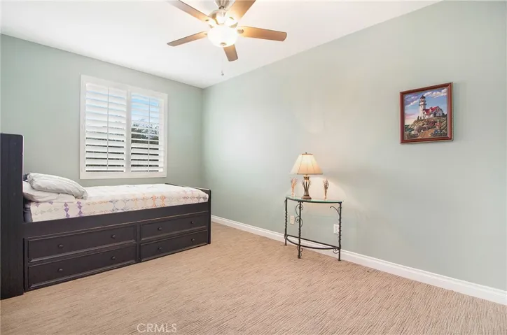 Fifth bedroom offers generous space.