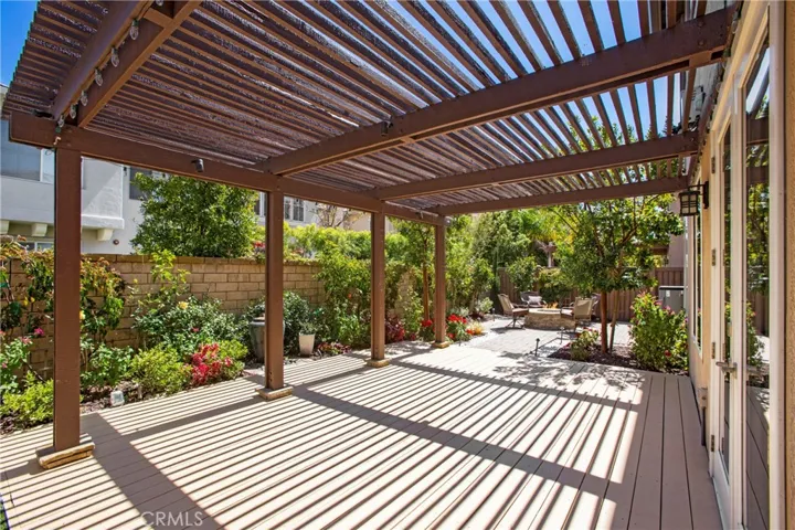 This fabulous entertainers yard offers a remodeled deck.