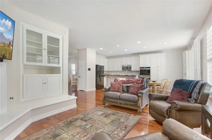 Cozy family room opens to the kitchen.