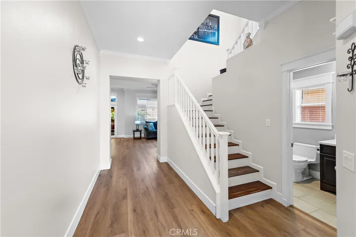 This open space greets you as you enter the home.  The downstairs bedroom is to the right so very private with a full bathroom.