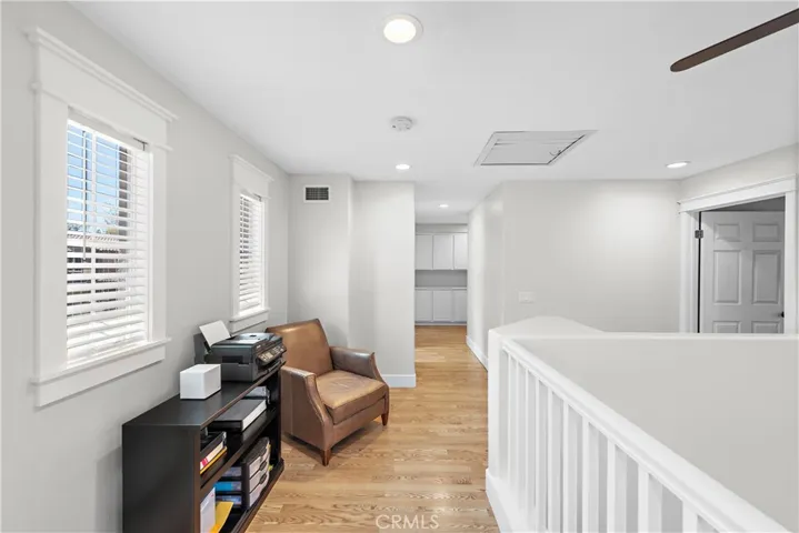 The upstairs landing/loft is ideal for a reading area or a tech center.  Many homeowners of this plan have built-in desks for a home office or homework area.