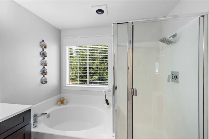 Primary bathroom with separate soaking tub and shower.  Mr. and Mrs. Clean live here so it's spotless.