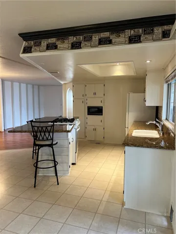 Family Looking into Kitchen