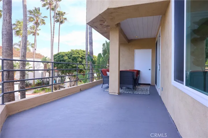 large patio with two storage closets
