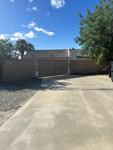 Rear gated entry to shop