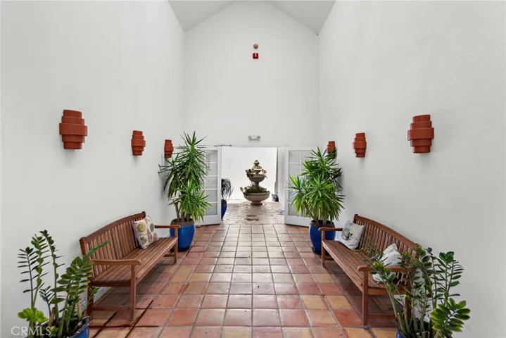 Enter the beautiful foyer of the building to access the stairs and elevators