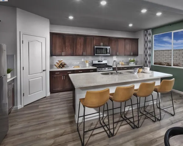Photo is not of the actual home, but is an inspirational photo of builder’s model home and may depic
