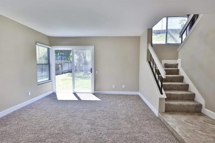Sliding doors out to backyard from living room