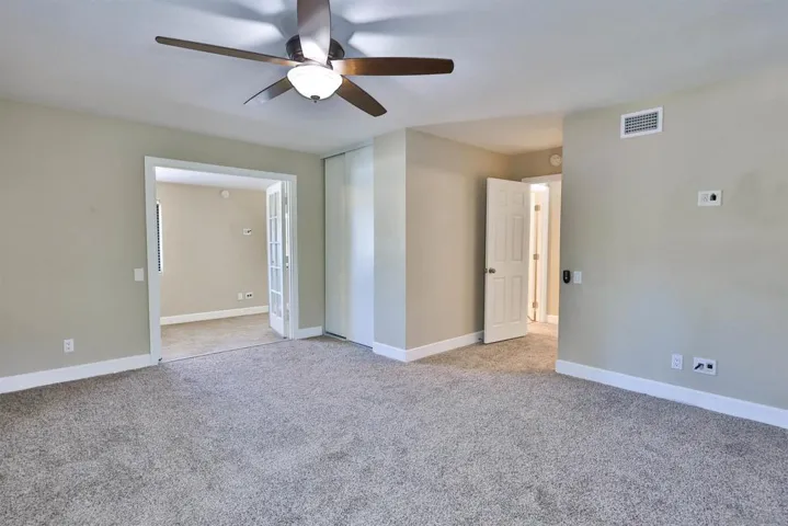 Bonus space off primary bedroom through opening at left