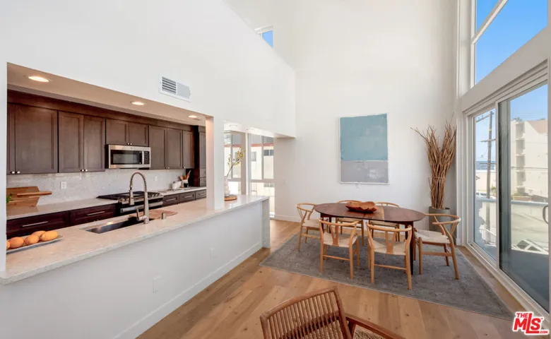 Main Floor | Dining Area | Balcony w/ Ocean Views | Kitchen
