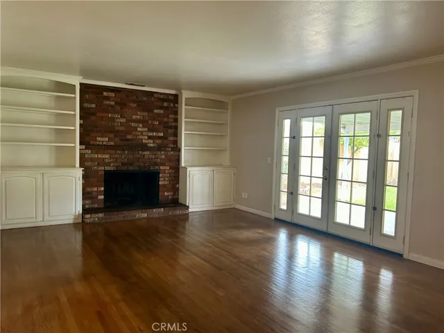 The living room is spacious with build in storage
