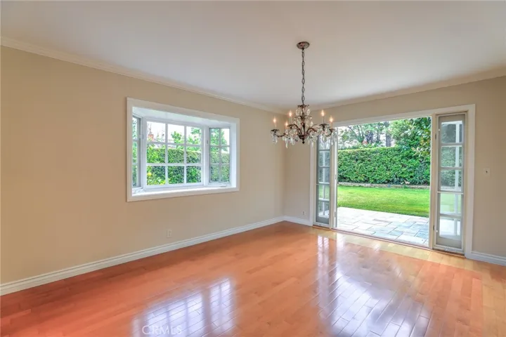 Views of the lush green backyard from the dining room.