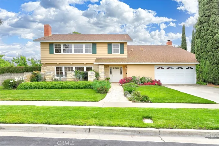 Welcome to 18022 Weston Place! With fabulous curb appeal, lush green grass and beautiful flower gardens.