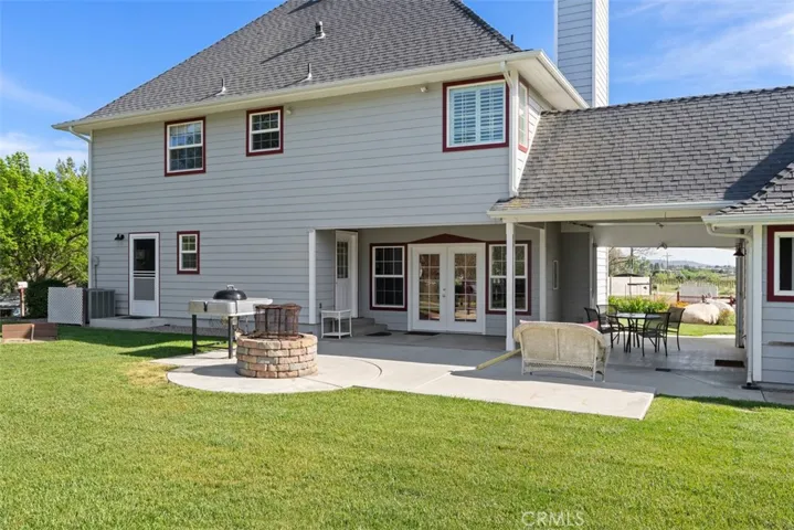 Rear of home with connecting breezeway to garage