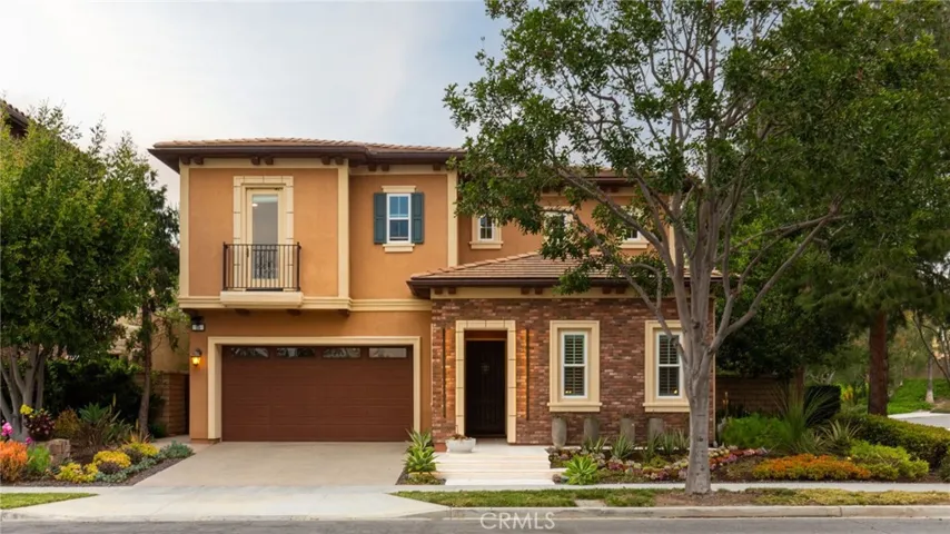 Luxurious former Summit Model home in prestigious Baker Ranch Community.