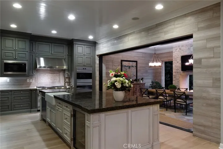 Seamless indoor-outdoor living with expansive glass pocket doors.