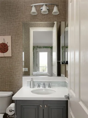 Modern ensuite bathroom with sleek fixtures and finishes.