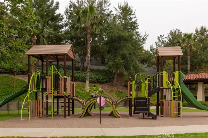 Playground area with swings and slides for children