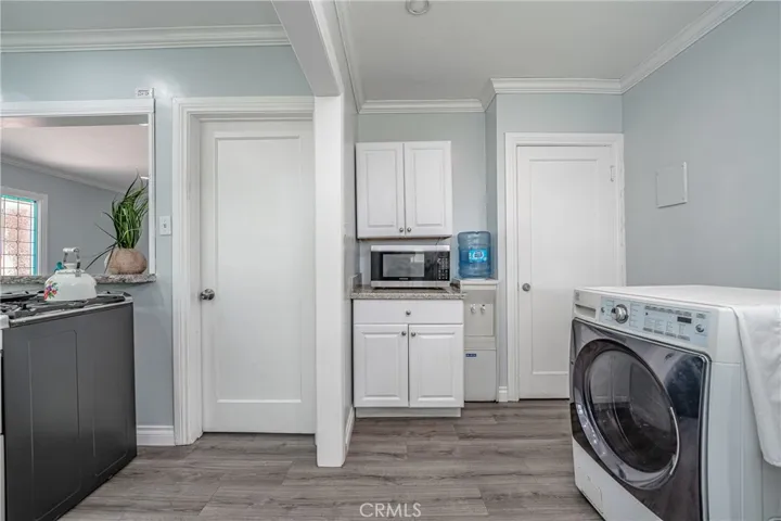 laundry room leads to basement