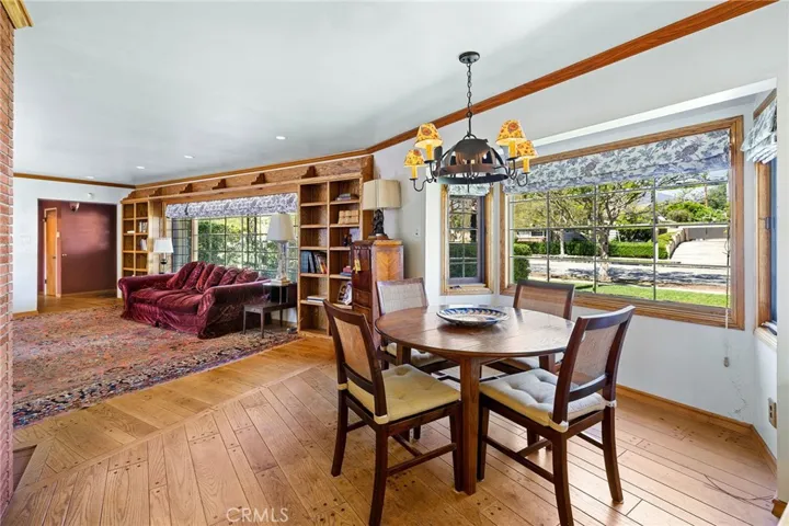 Dining room overlooking the front yard and open to the living room.
