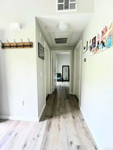 hallway to bed bath and laundry rooms