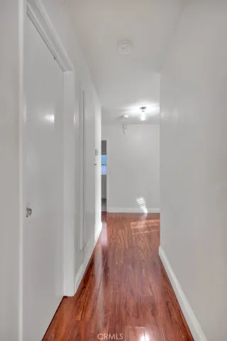 Hallway w/Wood Flooring.
