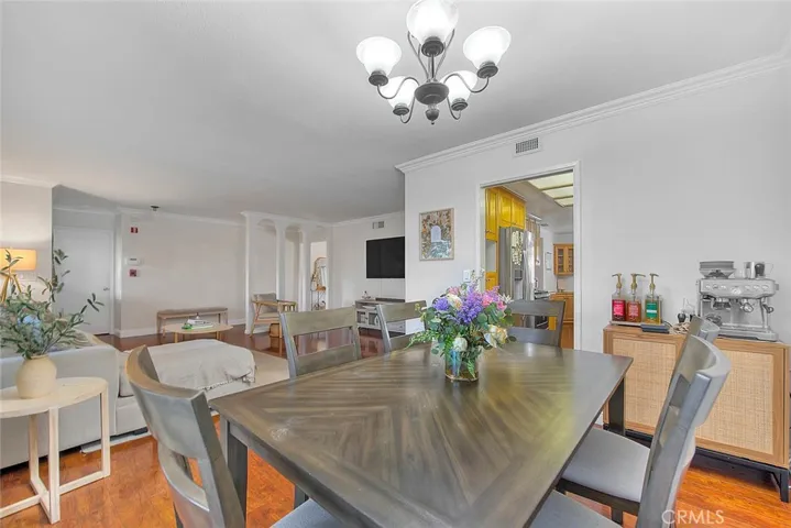 Dining Room Adjacent to Living Room and Kitchen.