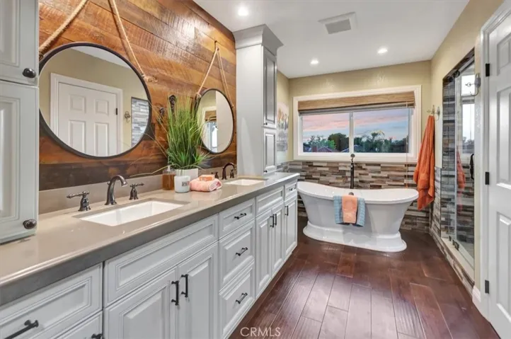 Soaking tub and dual sinks and large walk in closet in Primary bath