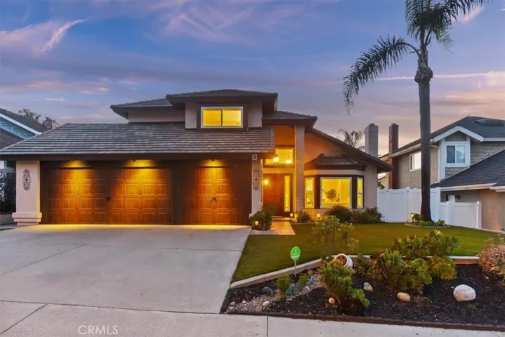 Home sits up high on the hill on a single loaded street