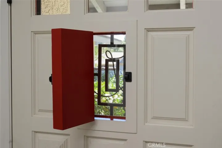 View of "speak easy" panel from interior
