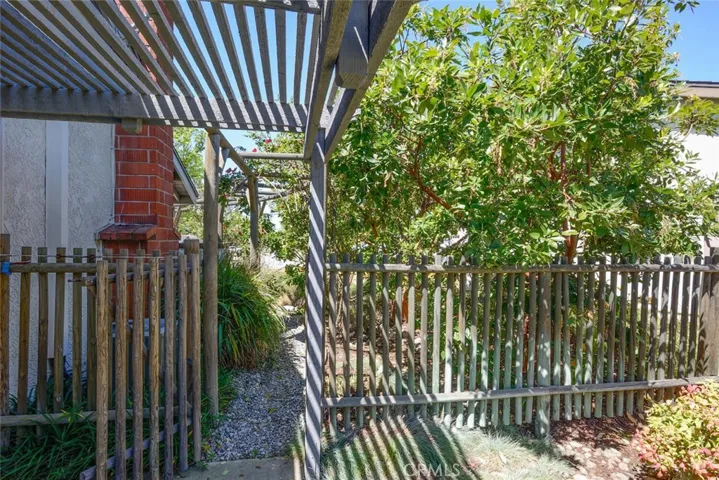 Side yard with gate leading to front yard