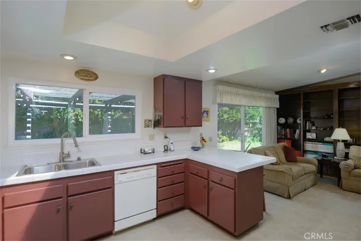 Newer double pane window and slider off views to inviting & peaceful patio