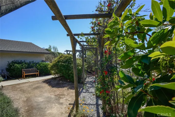 Arbor that leads to rear/side yard