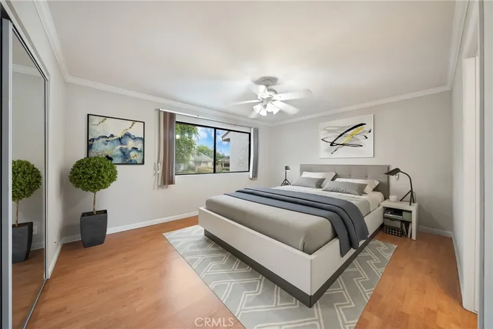 Virtual staging has been applied to the bedroom picture.