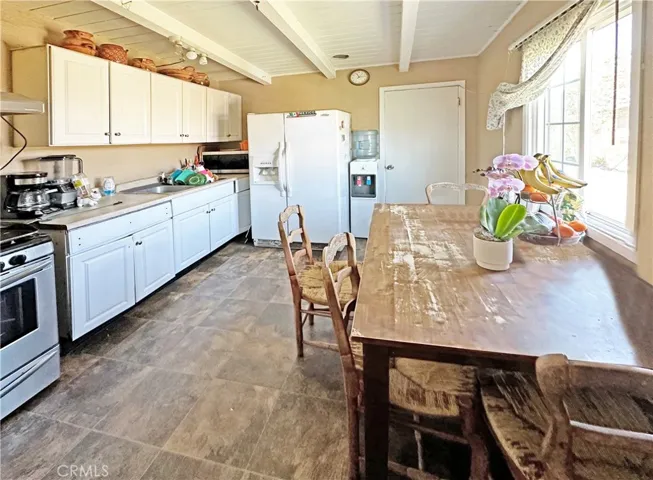 Eat-In Kitchen with Vaulted Open Beam Ceiling