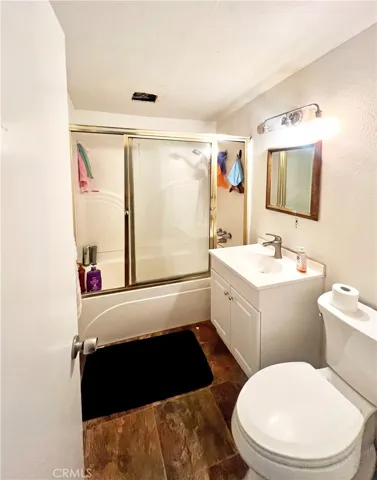Bathroom with Glass Enclosed Tub/Shower Combo