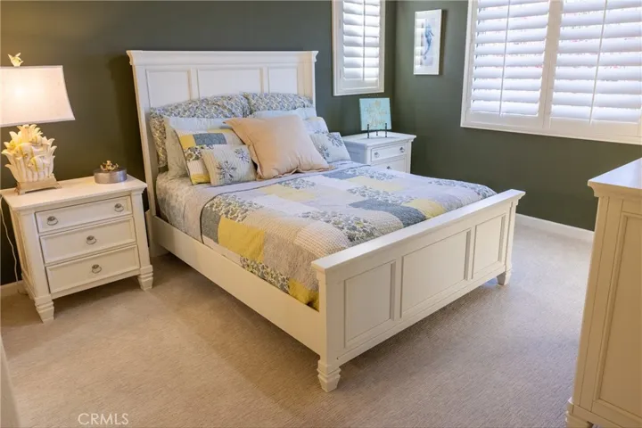 Secondary room with walk-in closest.